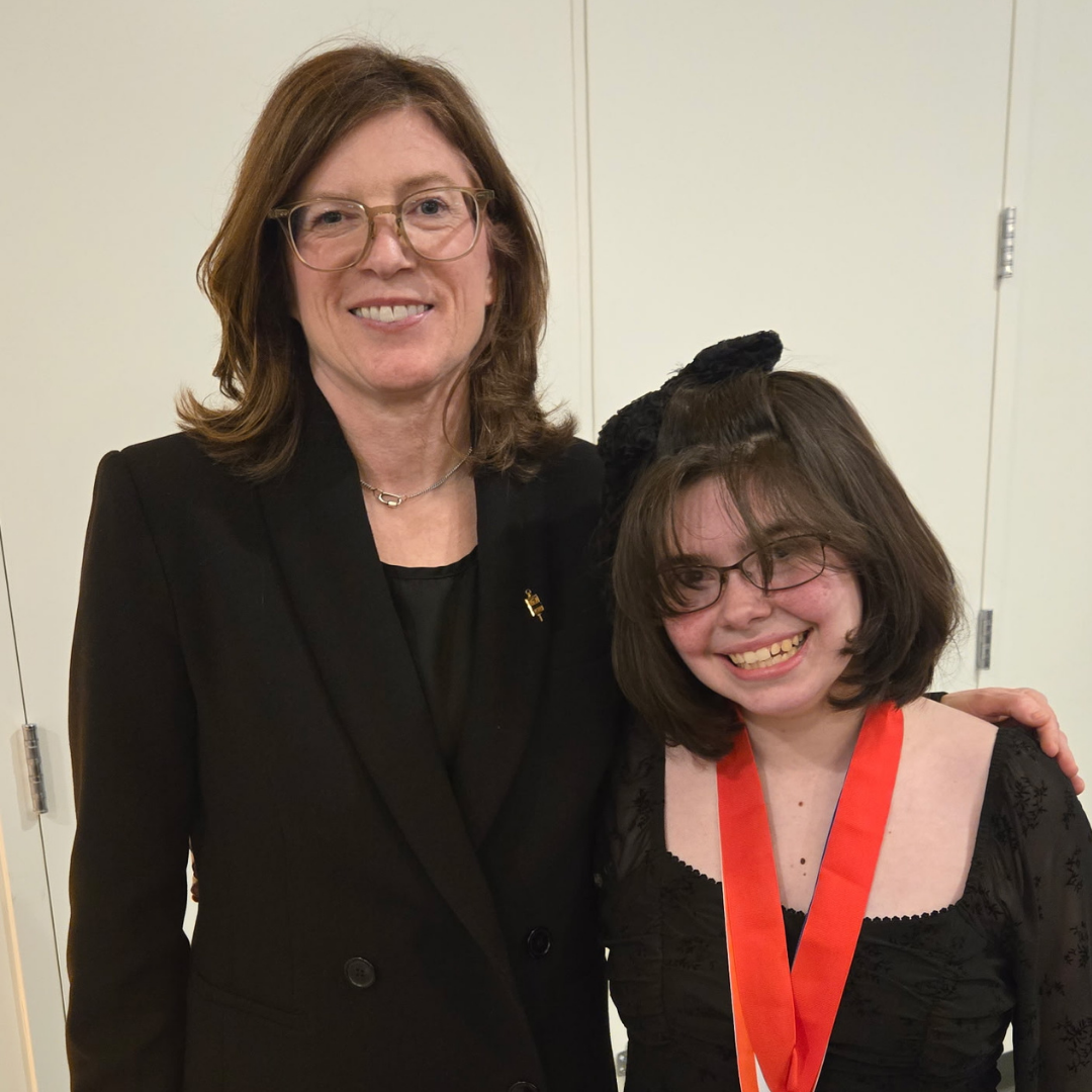 female student kadence standing with female president of ptk