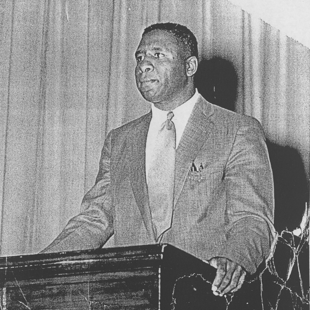 rev dr william amos booker smith sr standing at podium